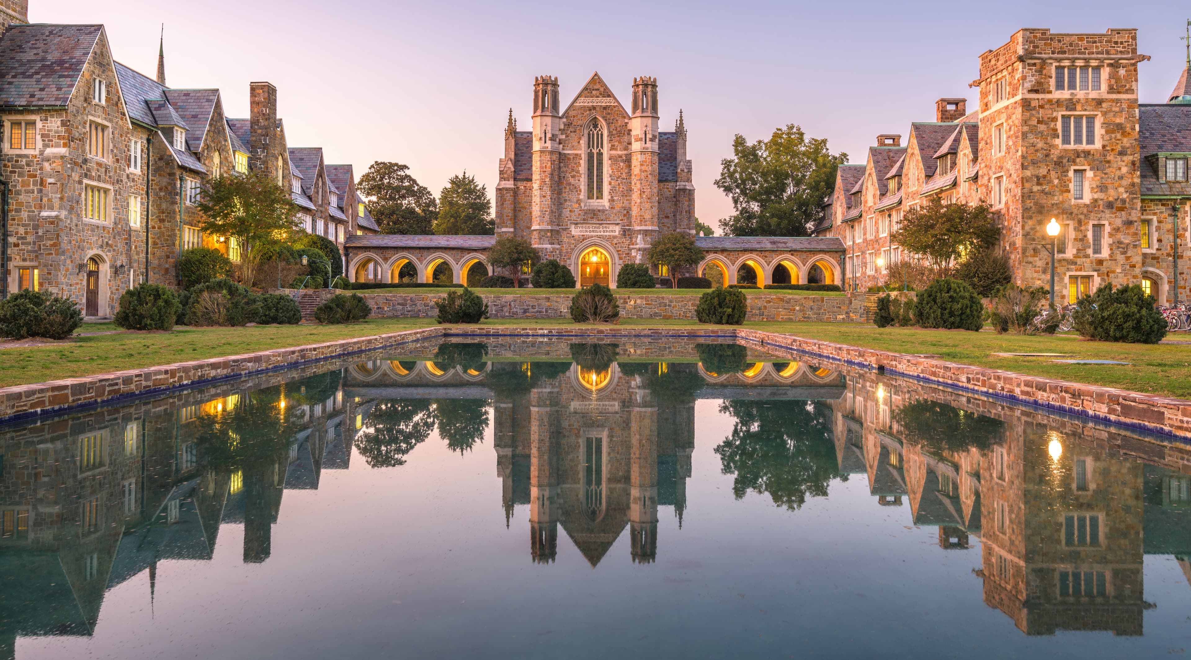 A beautiful college building with reflecting pool