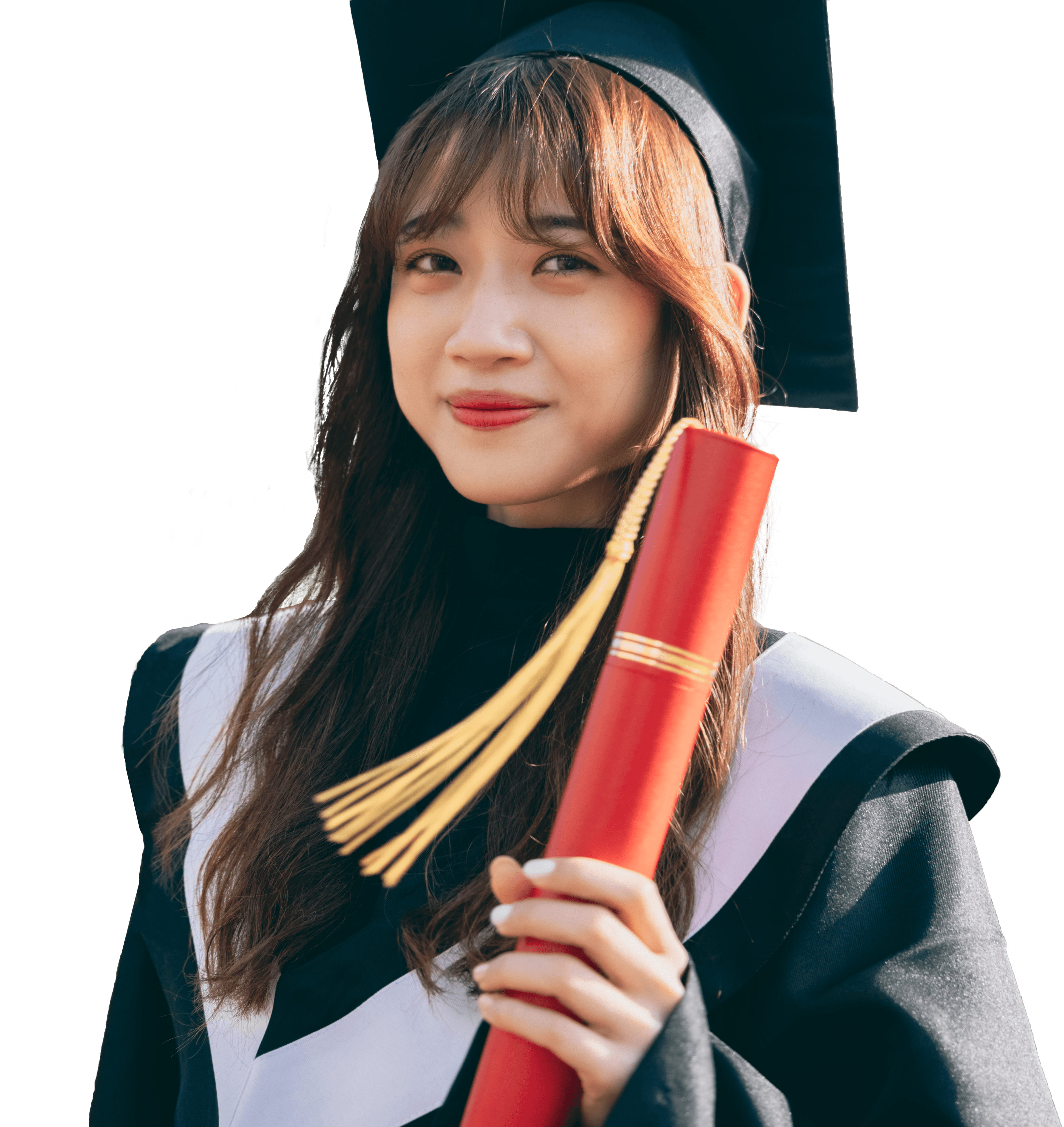 A proud girl in graduation robes wearing hat and tassle holding her college diploma